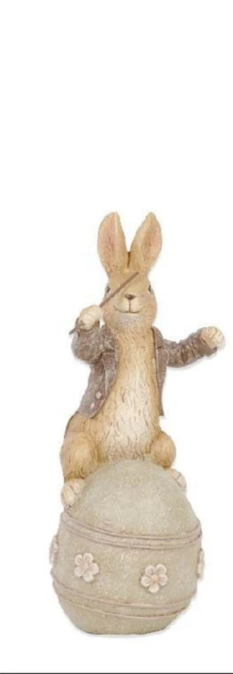 K and K Interiors Assorted 8 Inch Brown Resin Musical Bunnies on Eggs (3 Styles)
